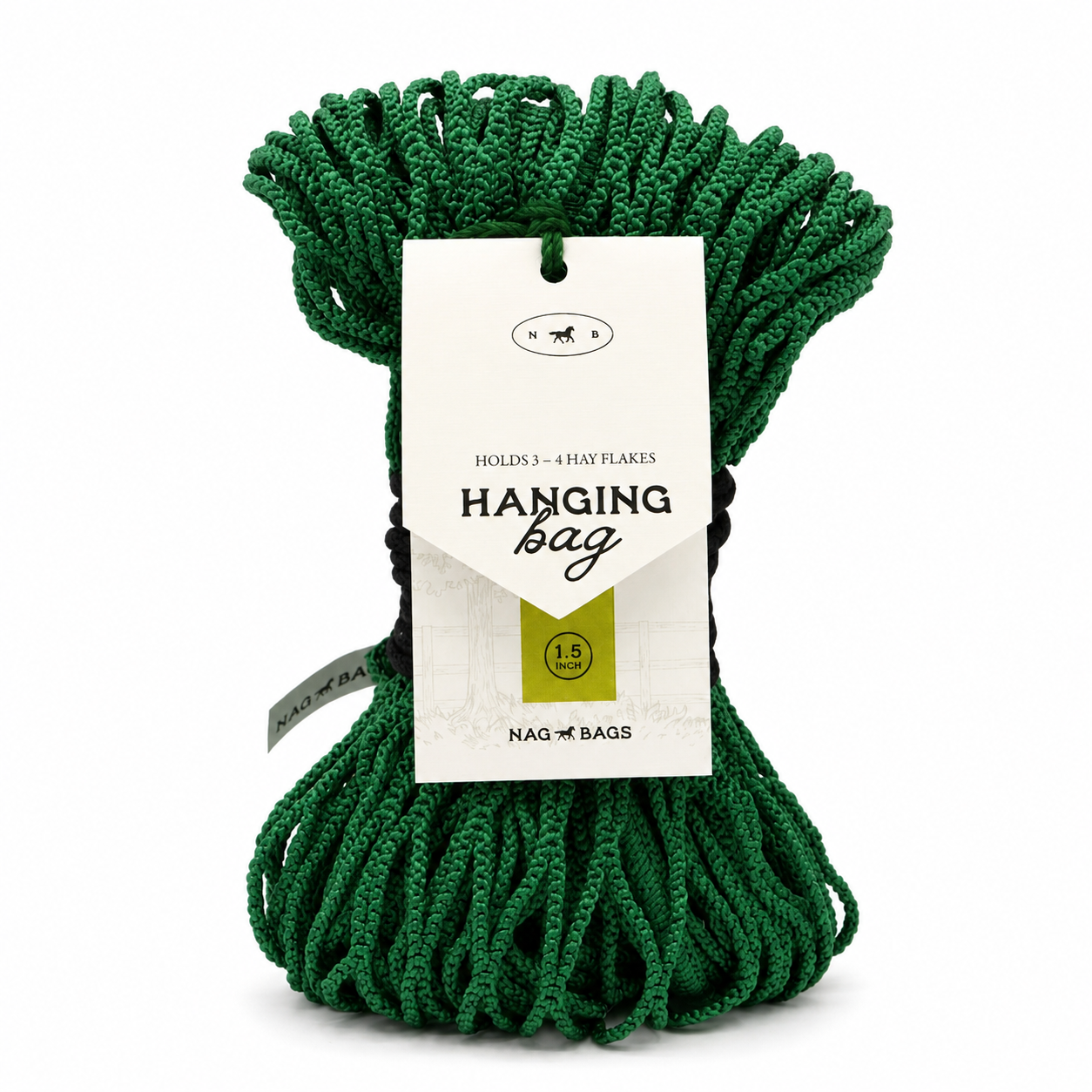 A green hanging bag hay net made of braided rope, bundled with a white paper tag that reads 'Hanging bag' and shows the Nag Bags logo, on a white background.