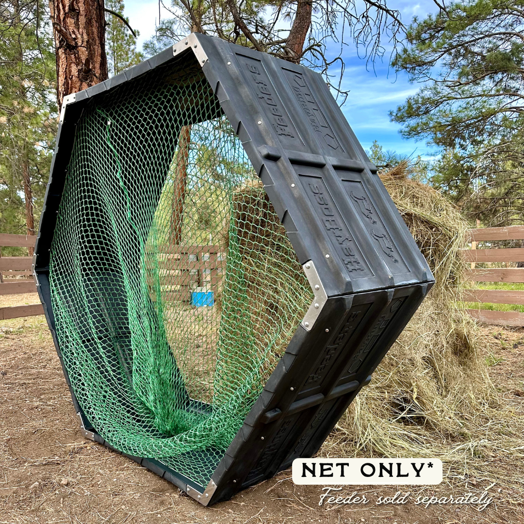 Hayboss feeder on its side showcasing the green knotless netting for feeding grazing animals 